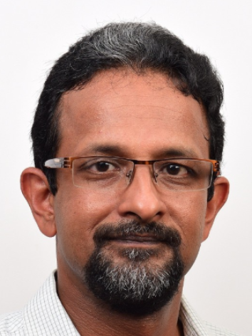 Dr. Thomas George T.