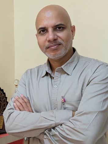 Dr.  Praveen Khare